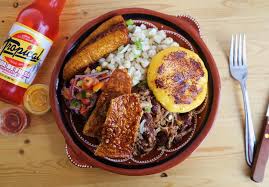 Hornado – Slow-roasted pork with corn and plantains
